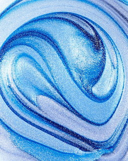Abstract blue and white swirl pattern with curved flowing lines