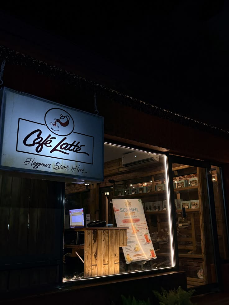 Cozy café interior with latte cups and warm lighting