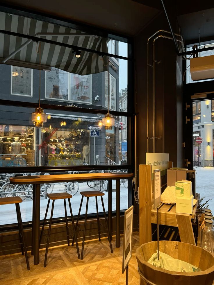Winter bakery cafe with coffee and pastries near a snowy window