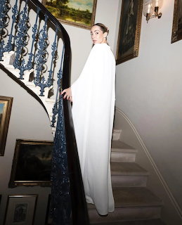 Woman in White Gown on Staircase