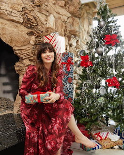 Woman by Christmas Tree