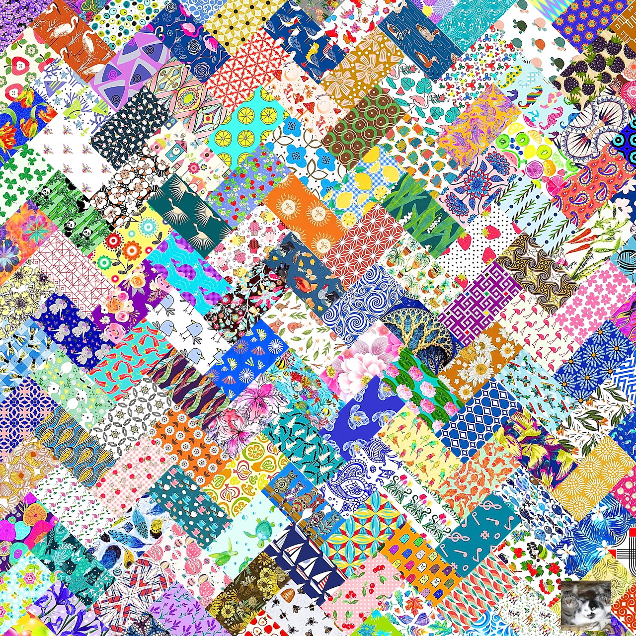 Colorful patchwork quilt with mixed fabric patterns including florals, dots, and geometric designs