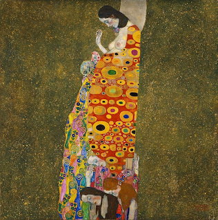 Klimt painting of pregnant woman in vibrant patterned dress with gold background
