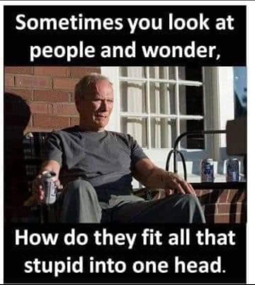 Older man seated outdoors with meme text above and below the photo