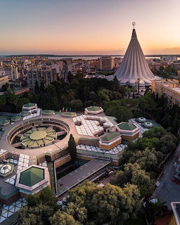 Aerial city view of the Sanctuary of Our Lady of Tears in Siracusa at sunset