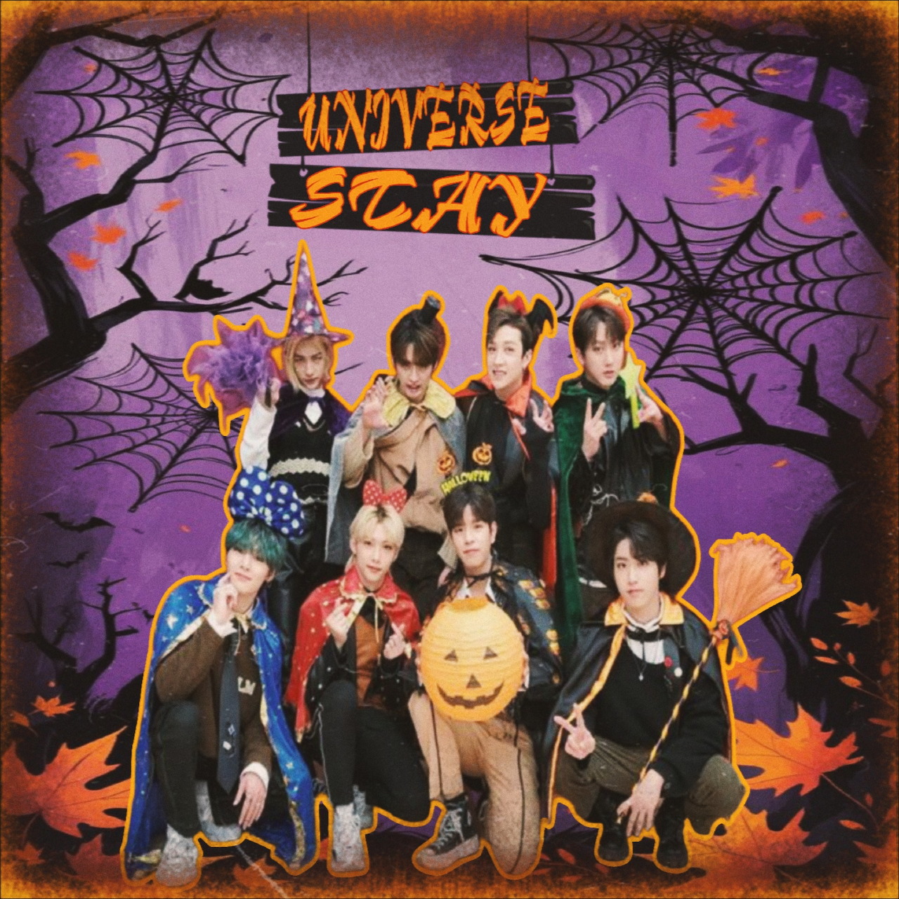 K-pop group in Halloween costumes with pumpkins and spiderweb decoration