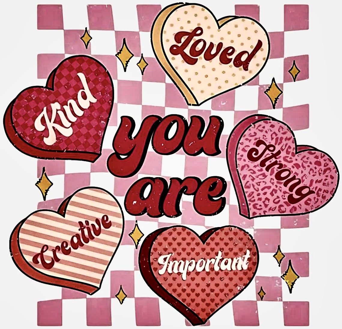 Assorted Valentine conversation hearts with loving messages on pink and white checkered background