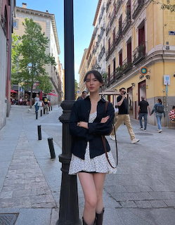 Woman in Black Jacket Street