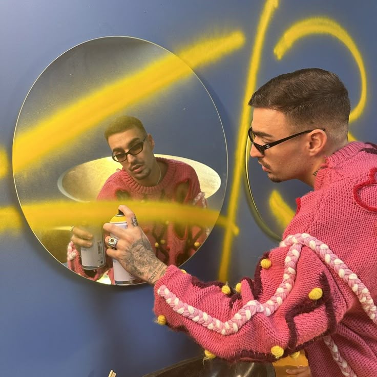 Man Painting Mirror