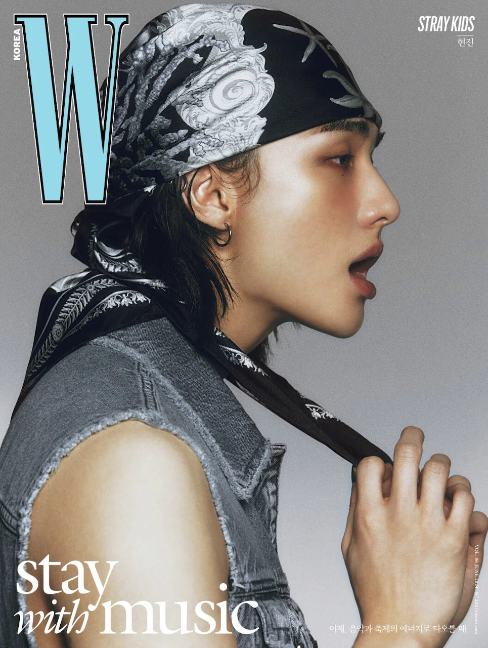 Hyunjin of Stray Kids on W Korea magazine cover wearing a patterned bandana and denim vest