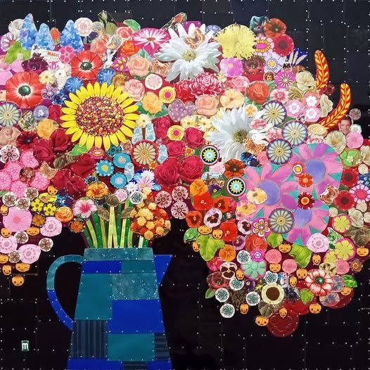 Vibrant collage of multicolored flowers including sunflowers, daisies, and abstract blooms spilling from a blue vase