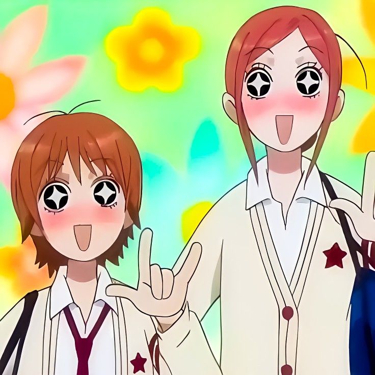 Two anime girls smiling with starry eyes in front of a colorful floral background