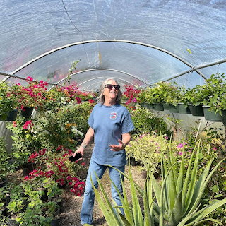 Woman in Greenhouse