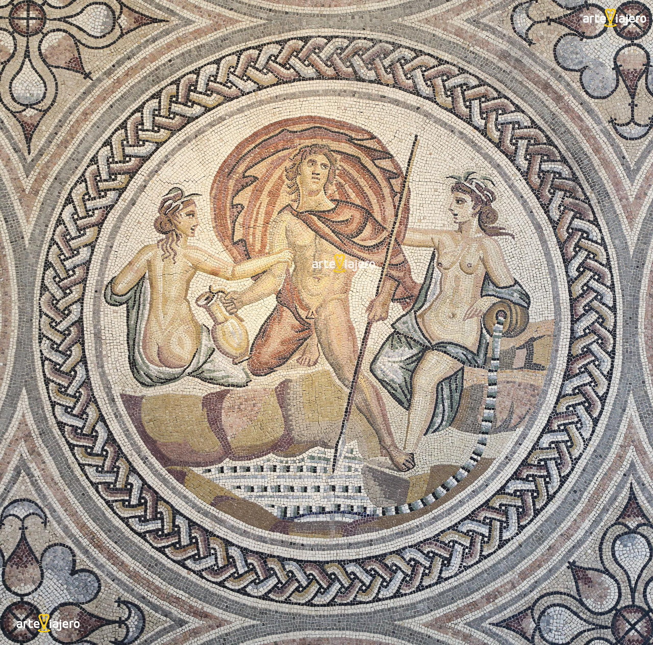 Ancient Roman mosaic with figures in circular frame and geometric border