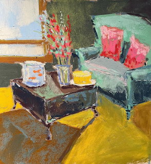Chalk pastel artwork showing a living room with green armchair, coffee table with fishbowl, flowers, and yellow floor