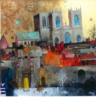 Painted winter village with white church and colorful buildings