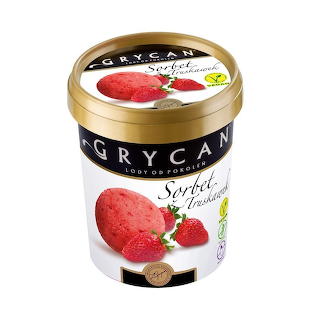 Tub of strawberry sorbet on a white background