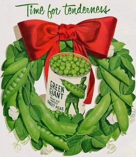 Vintage ad showing a wreath of green pea pods with red bow and a can of Green Giant sweet peas