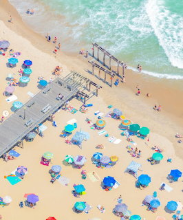 Aerial Beach Umbrellas and Pier
