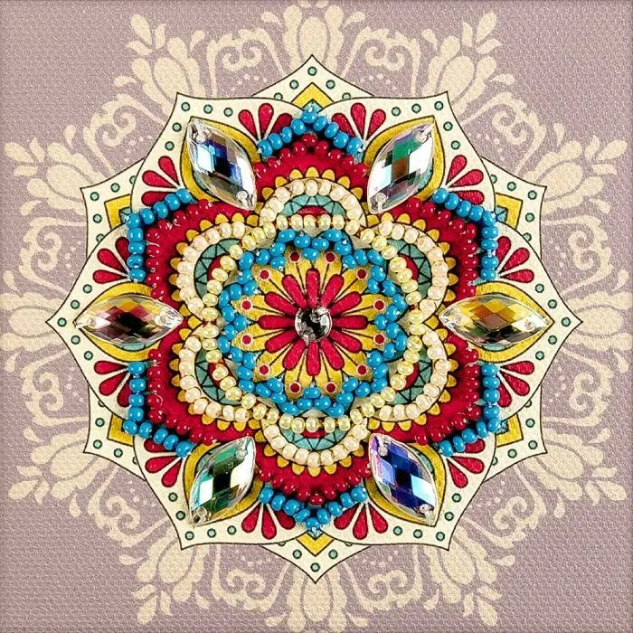 Colorful mandala with geometric floral patterns in red, blue, yellow and turquoise on beige ornamental background