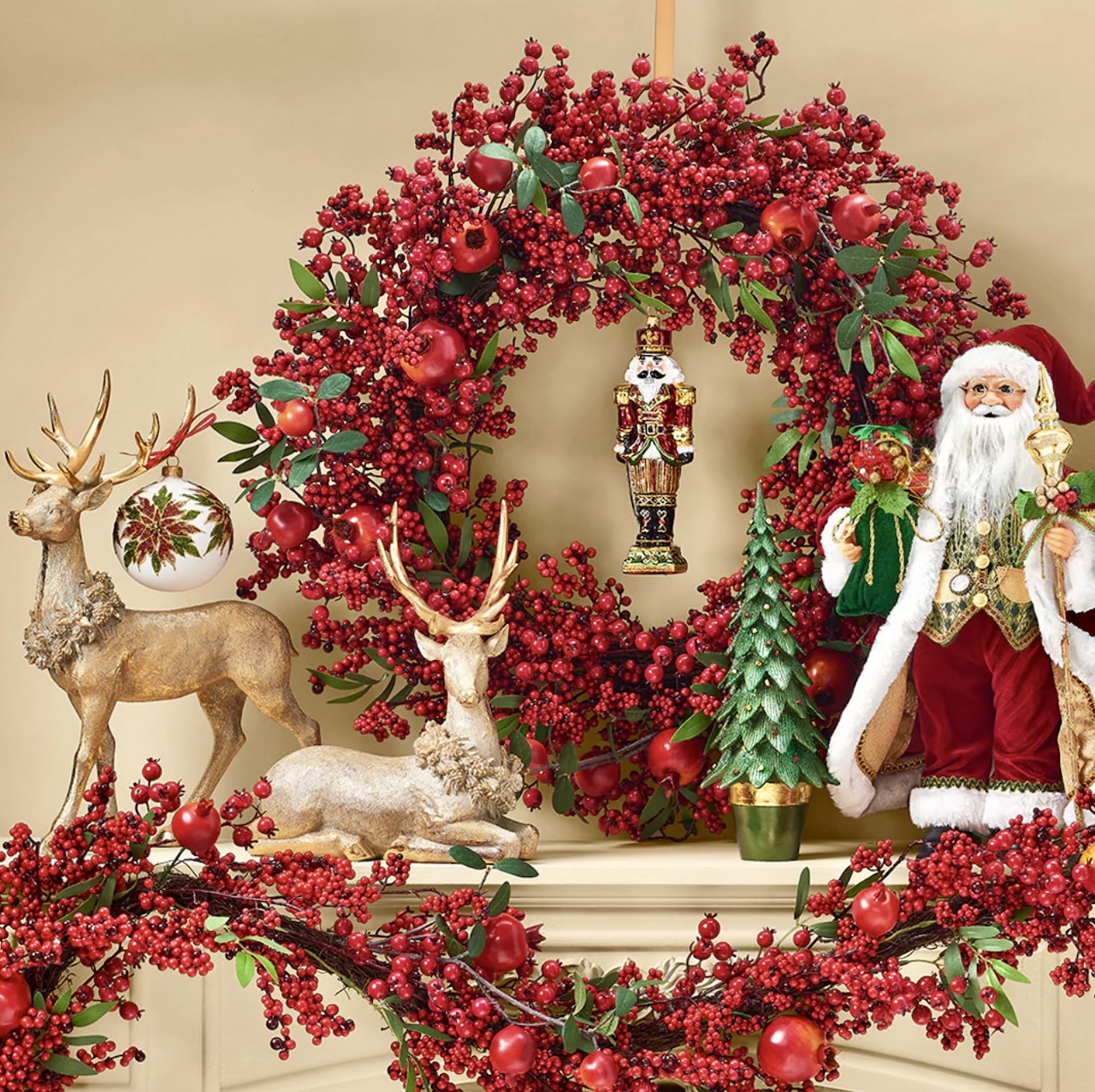 Christmas mantle with red berry wreath, Santa figure, white reindeer decoration, and nutcracker