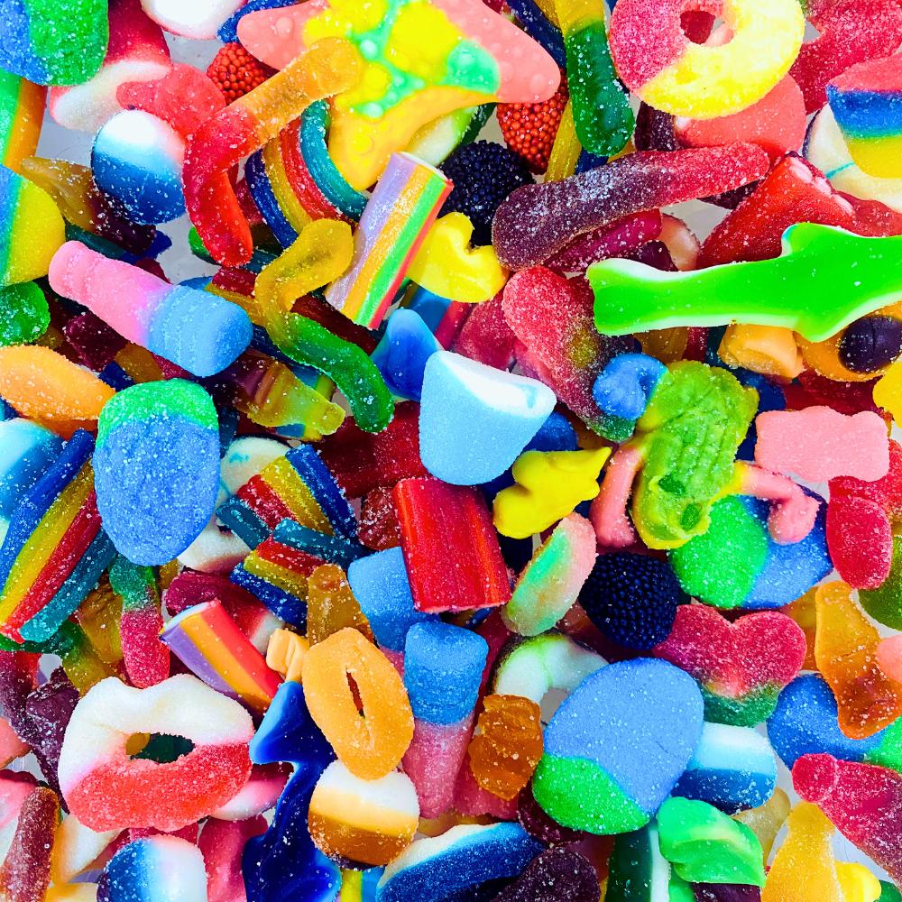 Close-up of assorted colorful gummy candies in various shapes and colors