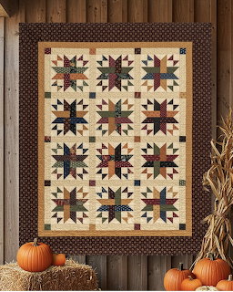 Patchwork quilt hanging on a wooden wall with pumpkins, hay bales, and dried corn stalks
