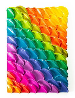 Abstract 3D rainbow colored waves flowing diagonally with glossy gradient surface from purple to blue