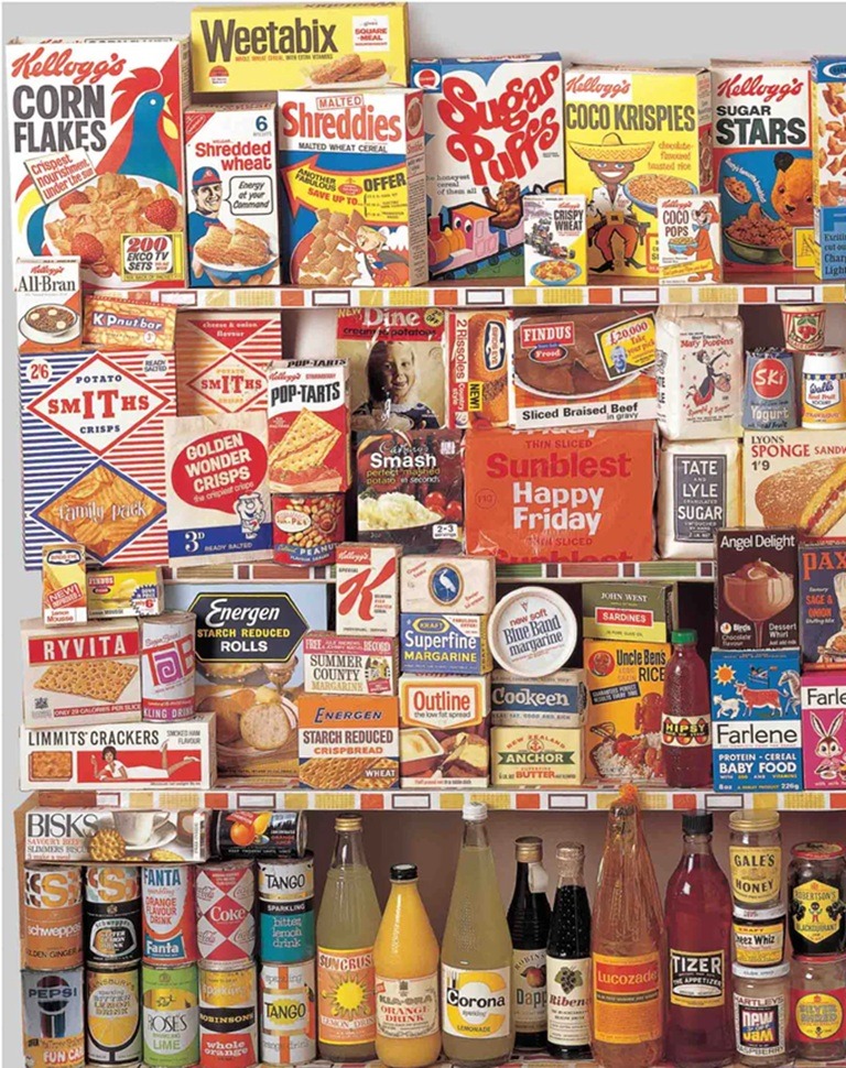 Collage of vintage food product packaging, labels, and bottles arranged on pantry shelves