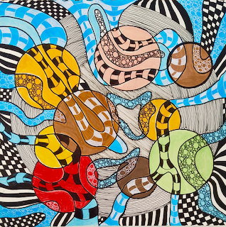Abstract art with multicolored patterned spheres on swirling black and white striped background
