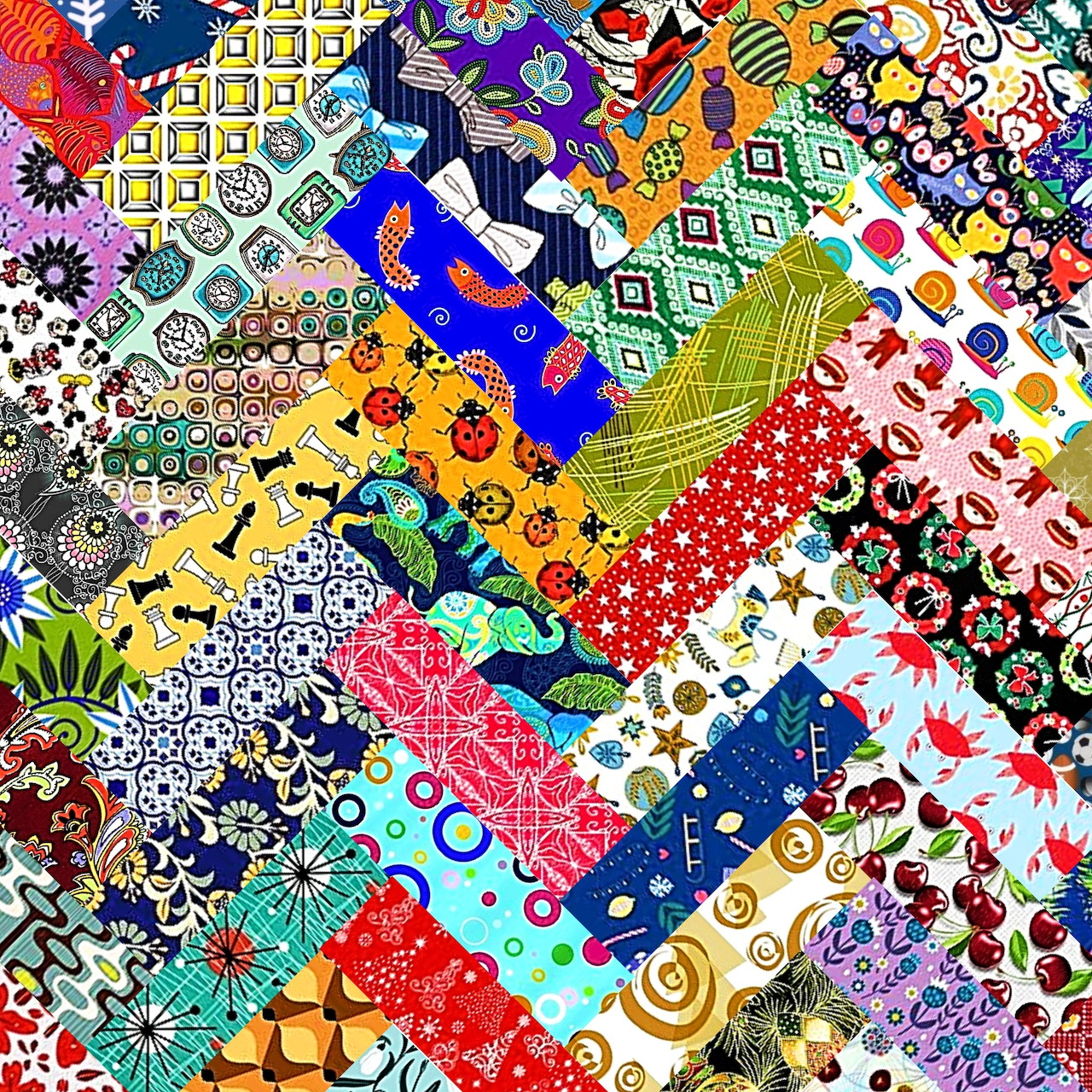 Colorful diagonal patchwork quilt with diverse patterns including flowers, dots, and geometric shapes in bright rainbow hues