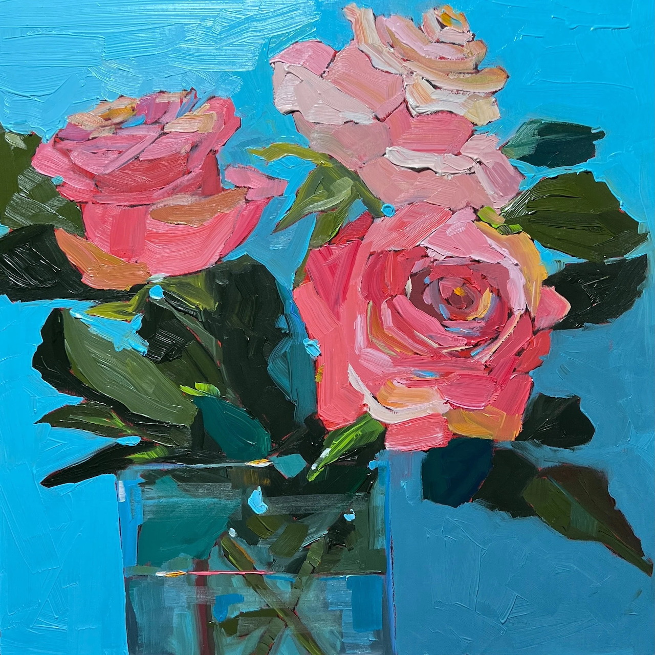 Oil painting of three pink roses in a clear glass vase on turquoise blue background
