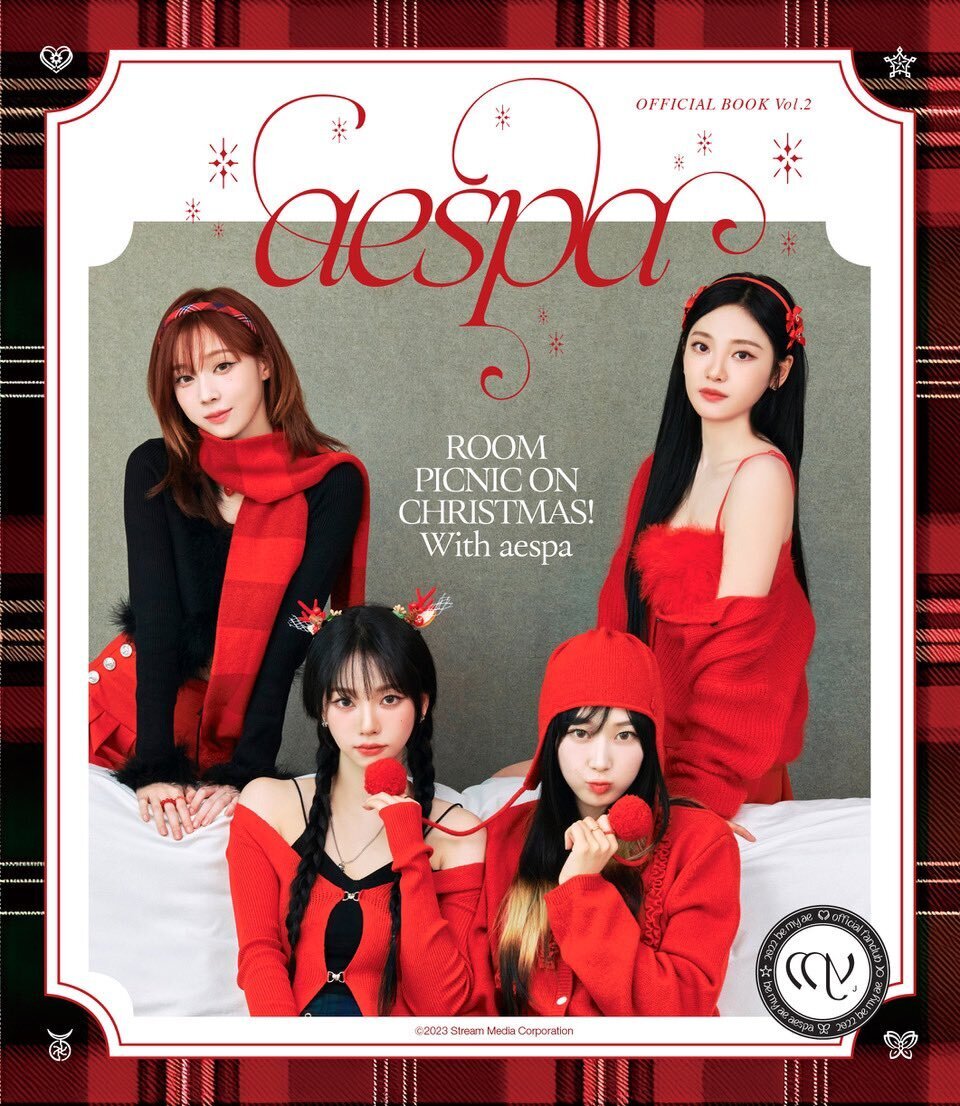 Aespa members in a festive Christmas-themed room picnic concept photo
