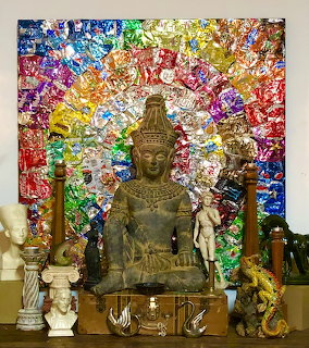 Buddha statue made from flattened soda cans
