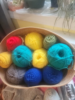 Colorful Yarn Balls in Basket