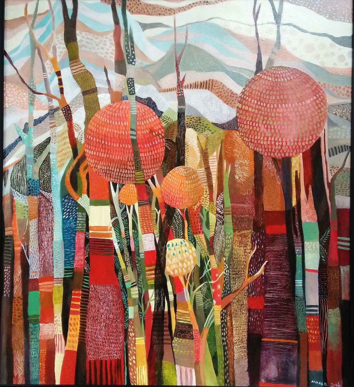 Abstract painting of patterned trees with red and orange round tops over hills