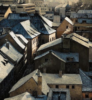 Overhead view of old European buildings with snow on rooftops and chimneys in winter