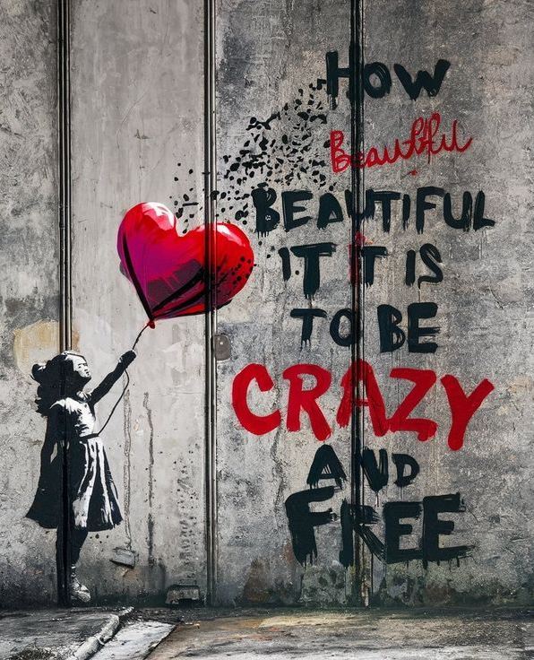 Silhouette of girl reaching for red heart balloon with text on wooden background
