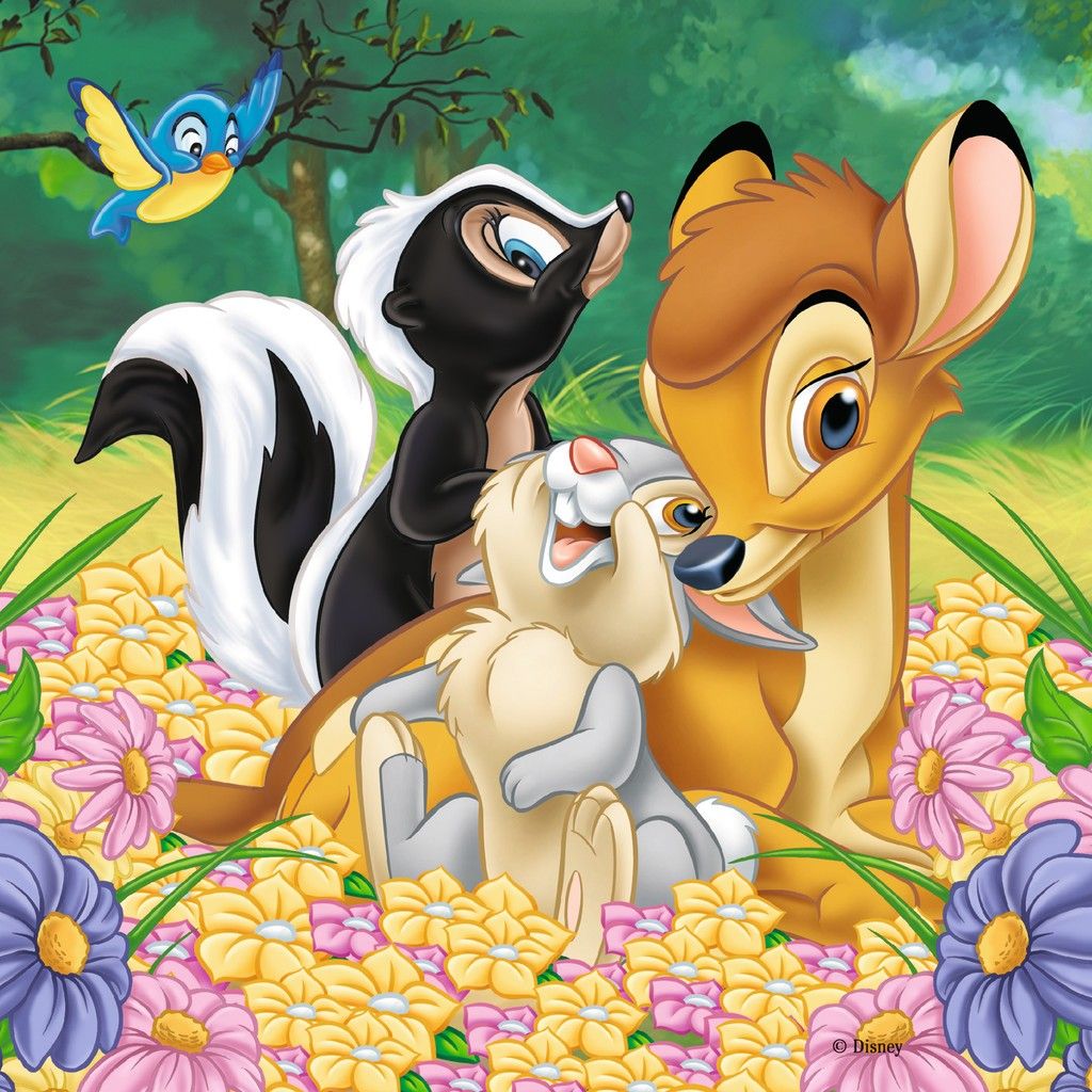 Bambi, Thumper, Flower and bluebird sitting together on a bed of pink, yellow and purple flowers in a green forest