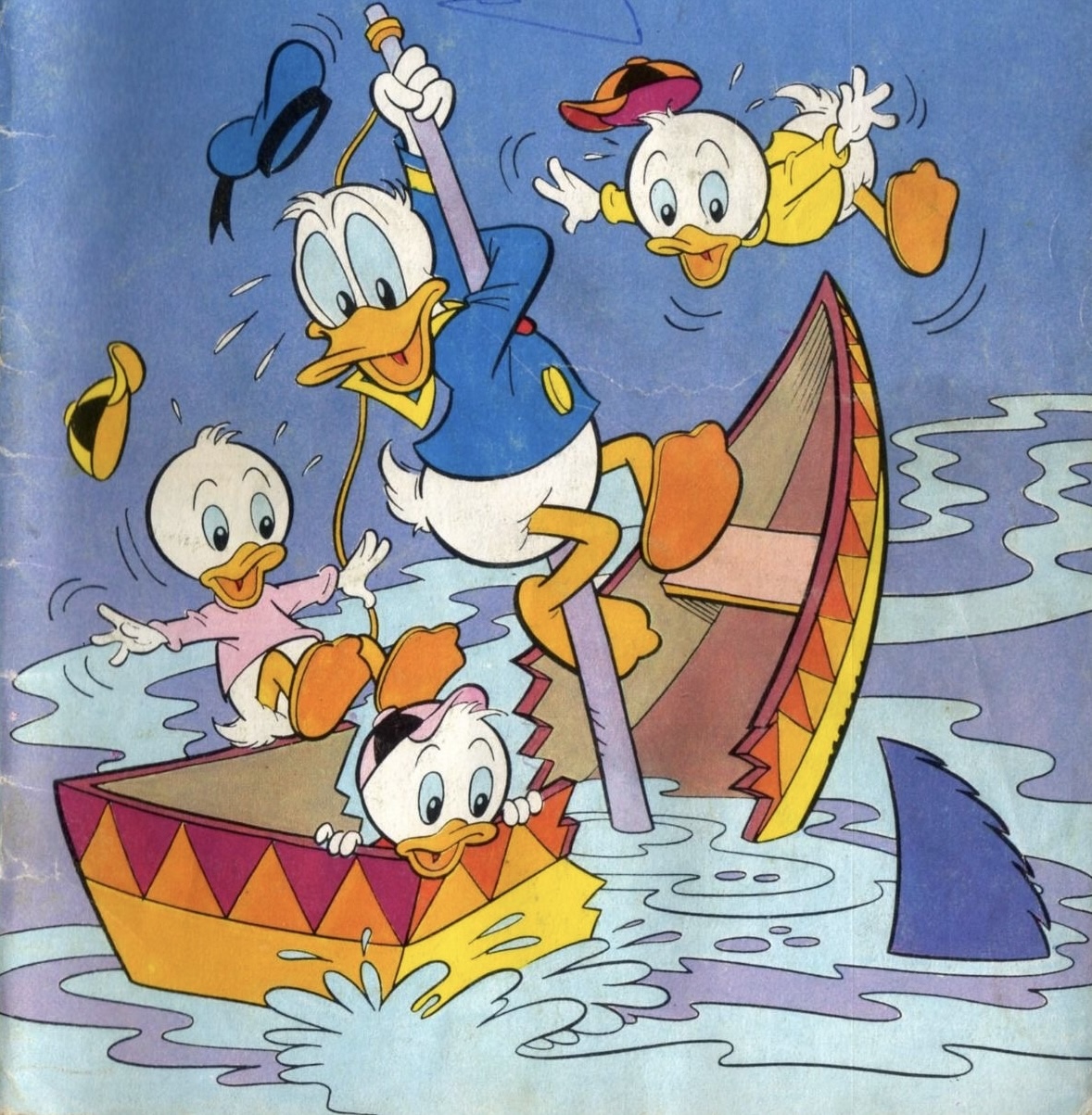 Donald Duck and his nephews in boats on the ocean with a shark fin nearby