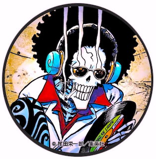 Illustrated skull wearing headphones with blue and red geometric shapes on circular background