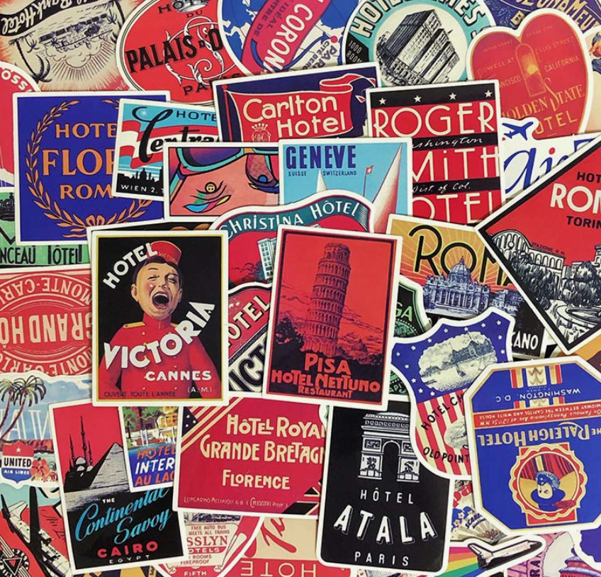 Collection of vintage travel hotel luggage labels in red, blue, and multicolor designs