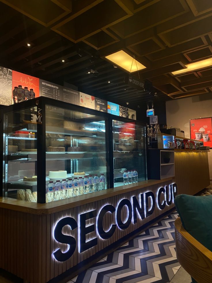 Second Cup cafe interior with coffee cups and warm lighting
