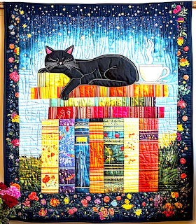 Black cat lying on a colorful patchwork quilt with a floral border and glowing window background