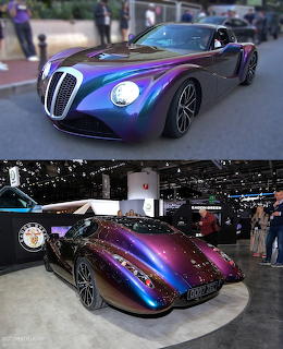 Purple-blue iridescent custom sports car with curved aerodynamic body at auto show