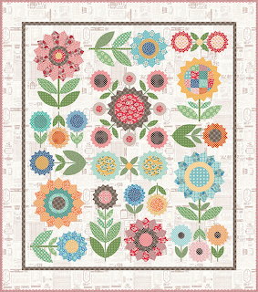 Folk art quilt with colorful geometric flowers and green leaves in grid layout
