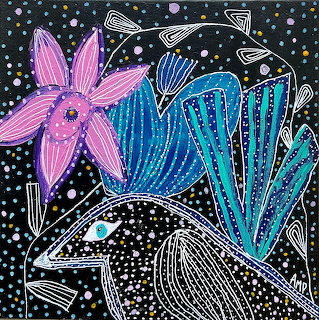 Folk art painting of blackbird with pink and blue flowers on dotted black background