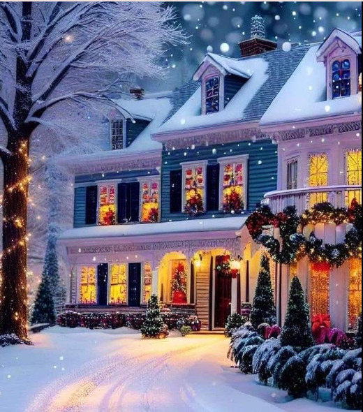 Snow-covered two-story house with Christmas lights and decorated windows glowing warmly at night
