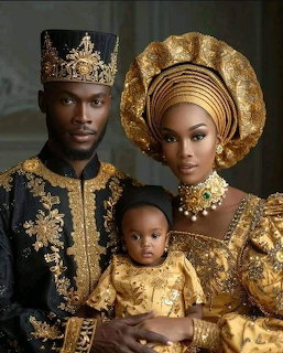 Family of three wearing ornate gold and black African traditional clothing with crowns and headwrap