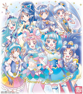 Group of nine anime magical girls in blue and white costumes with various hairstyles and accessories
